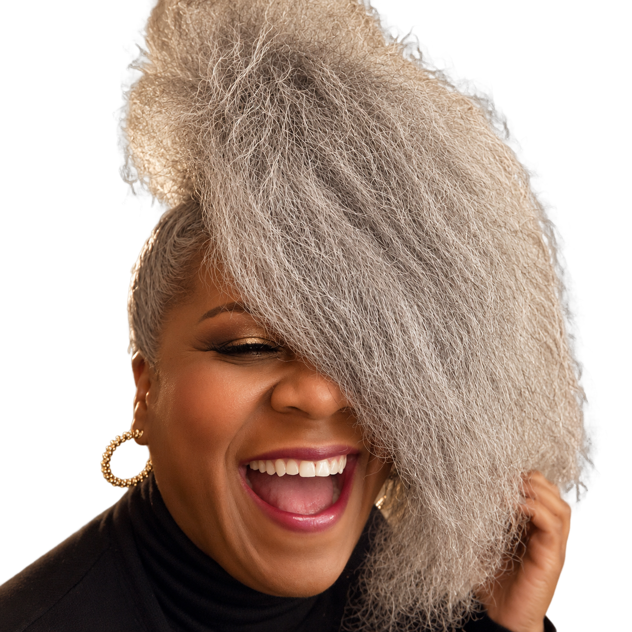Woman with silver hair, smiling joyfully.